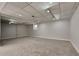 Spacious basement featuring neutral walls, carpet flooring, and ample lighting at 1083 Stoney Creek Ln, Austell, GA 30168