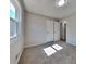 Bedroom featuring carpet flooring, a window, and a closet at 1083 Stoney Creek Ln, Austell, GA 30168