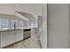 Well-lit kitchen featuring stainless steel appliances, light colored cabinets and hardwood floors at 1083 Stoney Creek Ln, Austell, GA 30168