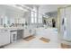 A spacious bathroom with tub, a vanity with drawers, and a glass shower at 325 Stonecastle Pass, South Fulton, GA 30331