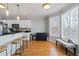 Bright kitchen nook with breakfast bar, stainless steel appliances, and natural light at 325 Stonecastle Pass, South Fulton, GA 30331