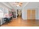 Versatile flex space with hardwood floors, featuring closet space, and potential as an office or playroom at 325 Stonecastle Pass, South Fulton, GA 30331