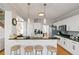 Beautiful kitchen with stone countertops, wooden floors and stainless steel appliances at 325 Stonecastle Pass, South Fulton, GA 30331