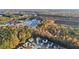 This aerial view shows the neighborhood's location, with highway access and wooded areas at 382 Daffodil Dr, Temple, GA 30179