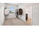 Spacious walk-in closet with built-in shelving and natural light at 382 Daffodil Dr, Temple, GA 30179