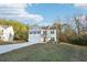Charming two-story home with a two-car garage and large front yard at 382 Daffodil Dr, Temple, GA 30179