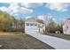 Charming two-story home with a two-car garage and large front yard at 382 Daffodil Dr, Temple, GA 30179