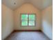 Bedroom with carpet and a window at 121 Honey Creek Rd, Conyers, GA 30094