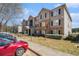 Apartment building with stone accents, covered entryway, and lawn; convenient parking at 5303 Fairington Club Dr # 5303, Lithonia, GA 30038