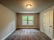 Bedroom featuring a large window for natural light at 123 Honey Creek Rd, Conyers, GA 30094