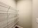 Walk-in closet with multiple tiers of shelving, providing ample storage space at 123 Honey Creek Rd, Conyers, GA 30094