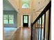 Grand foyer with soaring ceilings and hardwood floors, creating an impressive entry to the home at 123 Honey Creek Rd, Conyers, GA 30094