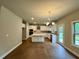 Well-equipped kitchen featuring stainless steel appliances, a center island, and modern cabinetry at 123 Honey Creek Rd, Conyers, GA 30094