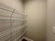 Walk-in closet with metal shelving units at 123 Honey Creek Rd, Conyers, GA 30094