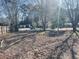 Spacious backyard with mature trees at 2179 Powers Ferry Dr, Marietta, GA 30067