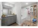 Bathroom featuring grey cabinets, granite countertops, and a shower with bathtub at 2700 Pine Tree Ne Rd # 1211, Atlanta, GA 30324