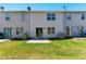 Exterior backyard view with grass and vinyl siding at 5338 Creekview Ln, Morrow, GA 30260