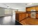 Bright eat-in kitchen featuring wood cabinets, stainless steel appliances, and a tile backsplash at 5338 Creekview Ln, Morrow, GA 30260