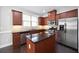 Modern kitchen with stainless steel appliances and granite countertops at 2308 Oakton Se Pl, Smyrna, GA 30082