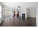 Bright living room with hardwood floors, a fireplace, and open layout at 2308 Oakton Se Pl, Smyrna, GA 30082