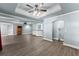Spacious basement featuring a bar area, recessed lighting, and wood-look flooring at 3070 Corsair Curv, Cumming, GA 30040