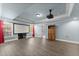 Finished basement area featuring a projection screen, cabinet, and neutral flooring at 3070 Corsair Curv, Cumming, GA 30040