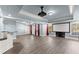 Spacious finished basement with projector screen, bar area, and ample room for activities at 3070 Corsair Curv, Cumming, GA 30040