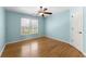 Comfortable bedroom boasts a ceiling fan and bright, natural light from the window at 3070 Corsair Curv, Cumming, GA 30040