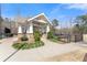 Charming community pavilion with stone accents, a paved walkway, and landscaped surroundings at 3070 Corsair Curv, Cumming, GA 30040