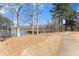 Scenic view of the lake with a lakeside walking trail and mature trees at 3070 Corsair Curv, Cumming, GA 30040