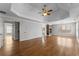Spacious main bedroom featuring hardwood floors, fireplace, and tray ceiling at 3070 Corsair Curv, Cumming, GA 30040