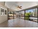 Spacious screened porch with tile flooring offers a relaxing outdoor living space at 3070 Corsair Curv, Cumming, GA 30040