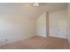 Large bedroom featuring vaulted ceilings and neutral color palette at 7347 Moss Stone Dr, Conyers, GA 30094
