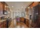 Modern kitchen featuring stainless steel appliances, granite countertops and hardwood floors at 7347 Moss Stone Dr, Conyers, GA 30094