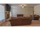 Spacious living room featuring a stone fireplace, and a view of couches with stylish throw pillows at 7347 Moss Stone Dr, Conyers, GA 30094