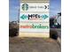 Retail sign featuring Starbucks, Moe's Southwest Grill, and Metro Brokers at 750 Great Oak Pl, Villa Rica, GA 30180