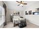 Comfortable bedroom featuring decor, a metal bed frame, carpeted floor, and lots of light at 174 Kelly St, Norcross, GA 30071