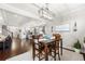 Open concept dining area adjacent to the kitchen with hardwood floors at 174 Kelly St, Norcross, GA 30071