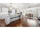 Bright kitchen with white cabinetry, a large island, and stainless steel appliances at 174 Kelly St, Norcross, GA 30071