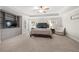 Spacious main bedroom with sitting area, tray ceilings, and neutral decor at 174 Kelly St, Norcross, GA 30071