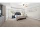 Spacious main bedroom with sitting area, tray ceilings, and neutral decor at 174 Kelly St, Norcross, GA 30071