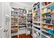 Spacious walk-in pantry with custom shelving for optimal storage at 174 Kelly St, Norcross, GA 30071