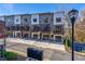 Exterior view of townhomes with attached garages and balconies at 2323 Mason Dr # D21, Atlanta, GA 30316