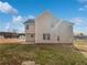 Exterior of the house shows a spacious yard at 545 Zoie Ln, Palmetto, GA 30268