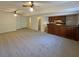Finished basement with retro-style bar, recessed lighting, and neutral carpet at 1750 Elizabeth Sw Ct, Conyers, GA 30094