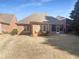 Brick home with screened in porch at 1832 Glenwood Ln, Snellville, GA 30078