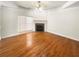 Bright room with hardwood floors and a cozy fireplace at 1832 Glenwood Ln, Snellville, GA 30078