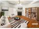 Bright living room with fireplace, hardwood floors, and stylish decor at 1832 Glenwood Ln, Snellville, GA 30078