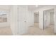 Bedroom with carpeted floor, a window with blinds, and white doors at 464 Reflection Dr # 22, Stockbridge, GA 30281