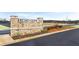 Stone entrance sign for Echo Glen community, surrounded by landscaping, creates a welcoming and established neighborhood feel at 464 Reflection Dr # 22, Stockbridge, GA 30281